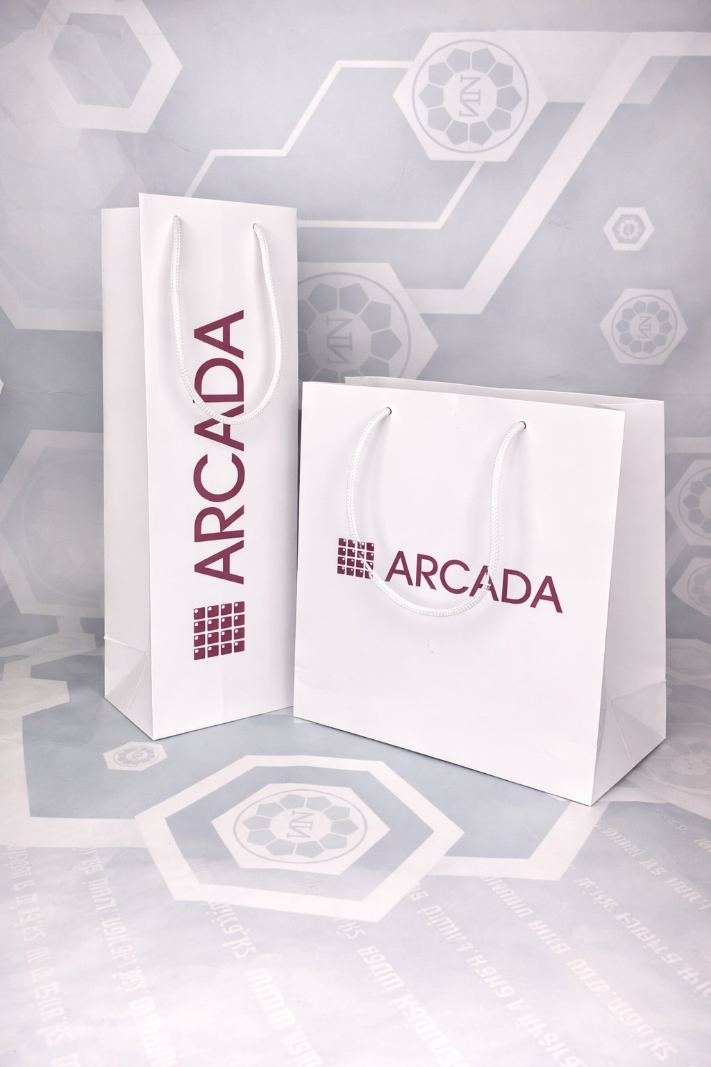 ARCADA — Бумажные пакеты с фирменной печатью, выполненная работа NAIRA